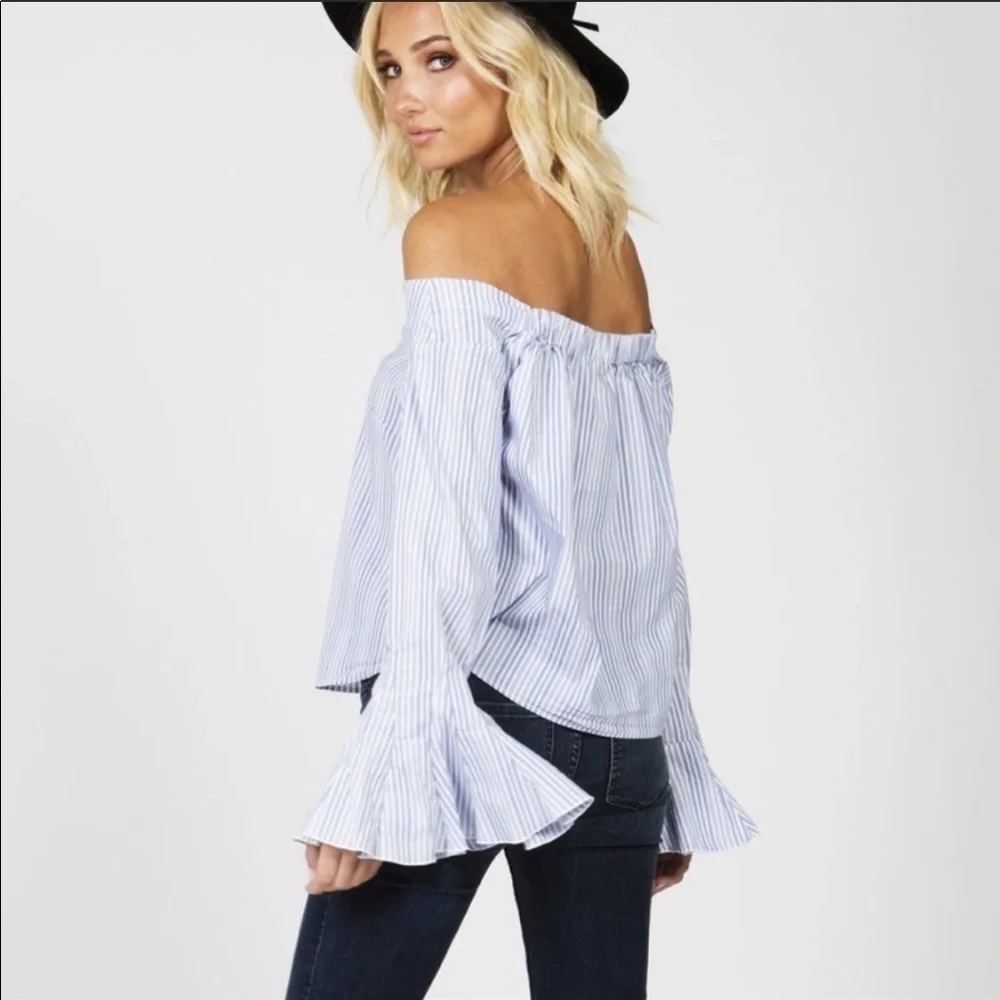 Free people march to the beat off shoulder top